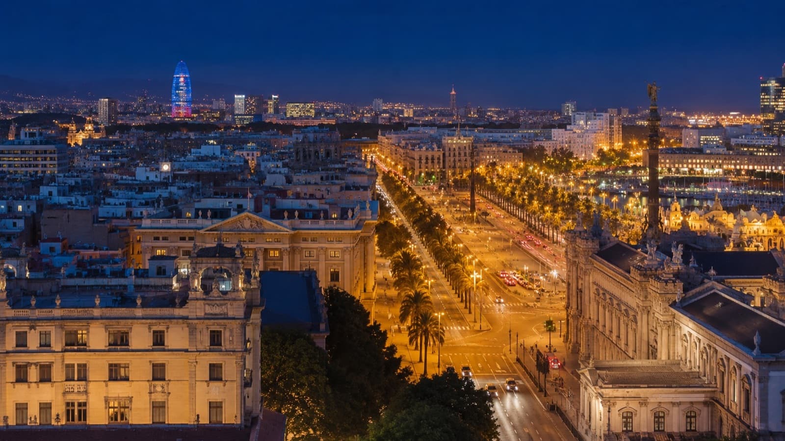 Barcelona street at night with warm alternative nightlife atmosphere
